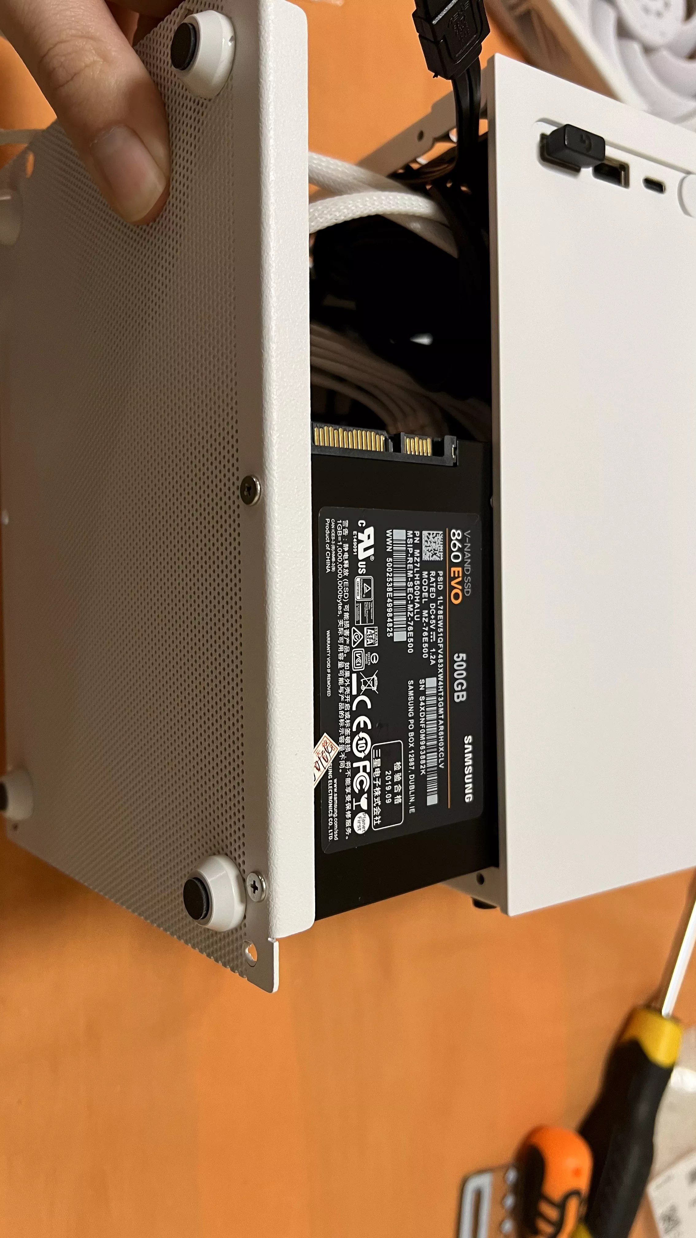 Tuck sata drive into the PSU compartment.webp